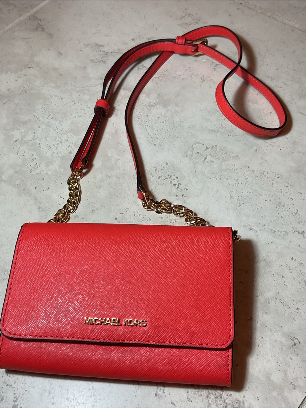 Michael Kors Jet Set Travel Saffiano leather 3-in-1 crossbody Coral Reef color.